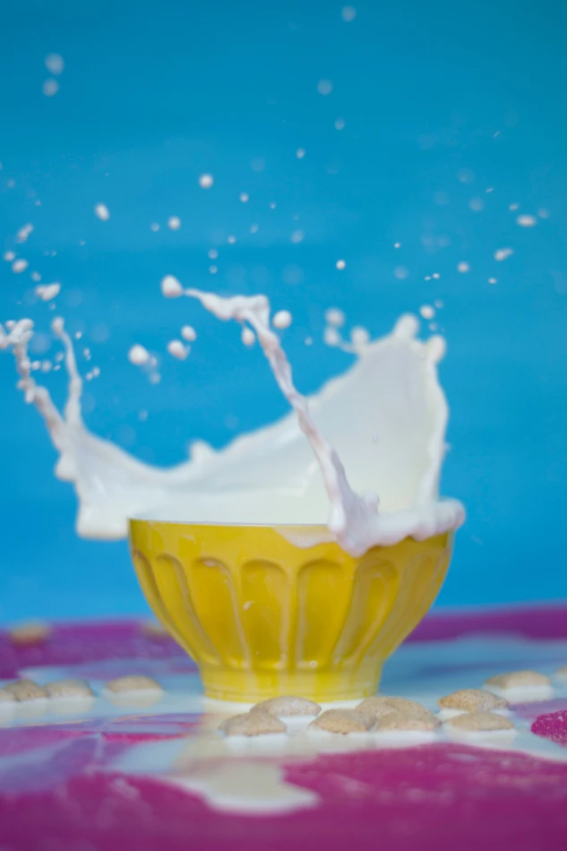 Milk splashing in bowl